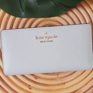 🆕 Kate Spade Staci saffiano leather large slim bifold wallet crystal blue mint